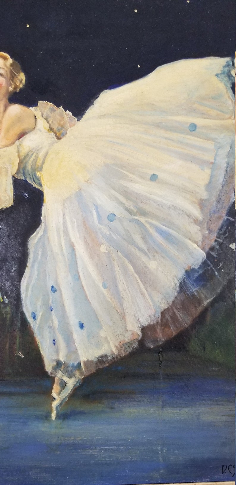 May include: A ballerina in a white tutu with blue accents dances on a dark blue stage. The background is a dark blue sky with white stars.