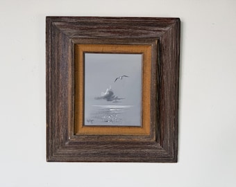 Pintura al óleo sobre lienzo de Rex Duggar, década de 1980, con paisaje marino, enmarcada.