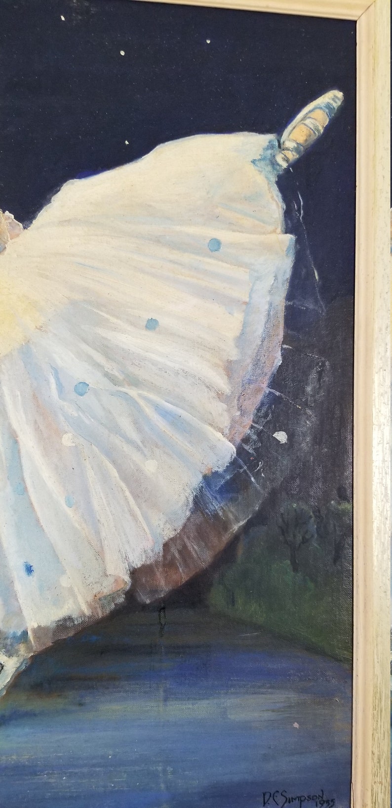 May include: A painting of a ballerina in a white tutu with blue accents, dancing under a starry night sky. The painting is signed "R.C. Simpson 1985" in the bottom right corner.