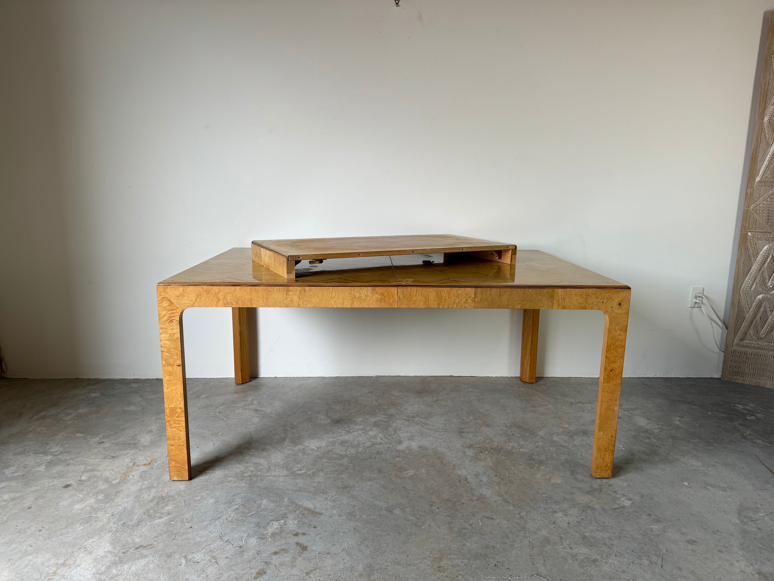 Extendable burl outlet wood dining table