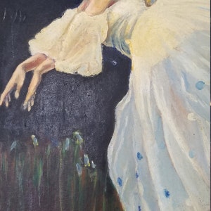 May include: A woman in a white dress with blue accents is posed in a ballet position. She is smiling and looking to the left. The background is dark blue with white stars.