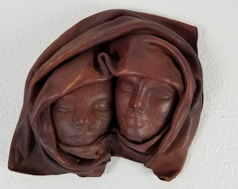 Vintage Wall Art Females Portraits Leather Sculpture.