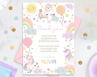 May include: A thank you card with a unicorn, rainbow, and clouds. The card says "Thank you for celebrating my 1st birthday with me. Thank you for your kind words and thoughtful gift. Love from Olivia."