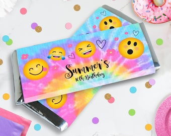 May include: Two colorful tie-dye candy bar wrappers with emoji faces and the text "Summer's 10th Birthday".