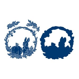 May include: A blue die-cut design featuring a wreath with a pumpkin and a rabbit inside. The design is shown with and without the cut-out details.