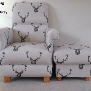 May include: A matching armchair and footstool set upholstered in light grey fabric featuring a repeating black stag head design. The chair has rolled arms and wooden legs. The text "Fryetts Stag Fabric in Charcoal Grey" is visible.
