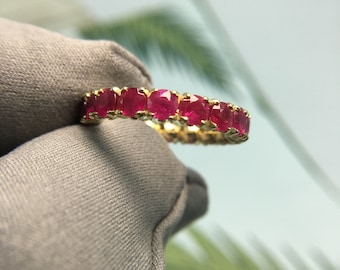 Ruby Eternity Ring in 18K Yellow Gold