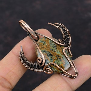 Spessartine Garnet in Limestone Pendant Copper Wire Wrapped Gemstone Pendant Wire Wrap Bull Face Shape Pendant Handmade Copper Wire Jewelry