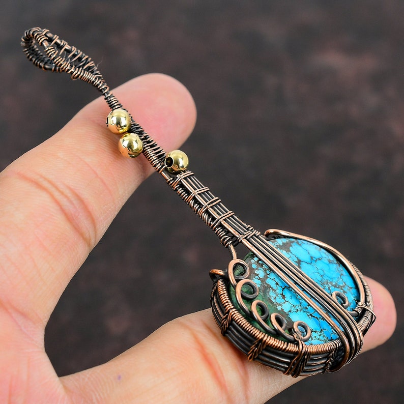 #TurquoiseStone
#CopperWire
#WireWrapJewelry
#NaturalGemstone
#WrappedPendant
#CopperPendant
#WireJewelry
#GuitarPendant
#Handmade
#WireWeaving
#WireWrapping
#CopperTurquoise
#HandmadeJewelry
#WireWrappingStone
#GemstoneJewelry
#HandmadeCopperJewelry