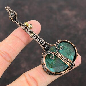 #TurquoiseStone
#CopperWire
#WireWrapJewelry
#NaturalGemstone
#WrappedPendant
#CopperPendant
#WireJewelry
#GuitarPendant
#Handmade
#WireWeaving
#WireWrapping
#CopperTurquoise
#HandmadeJewelry
#WireWrappingStone
#GemstoneJewelry
#HandmadeCopperJewelry