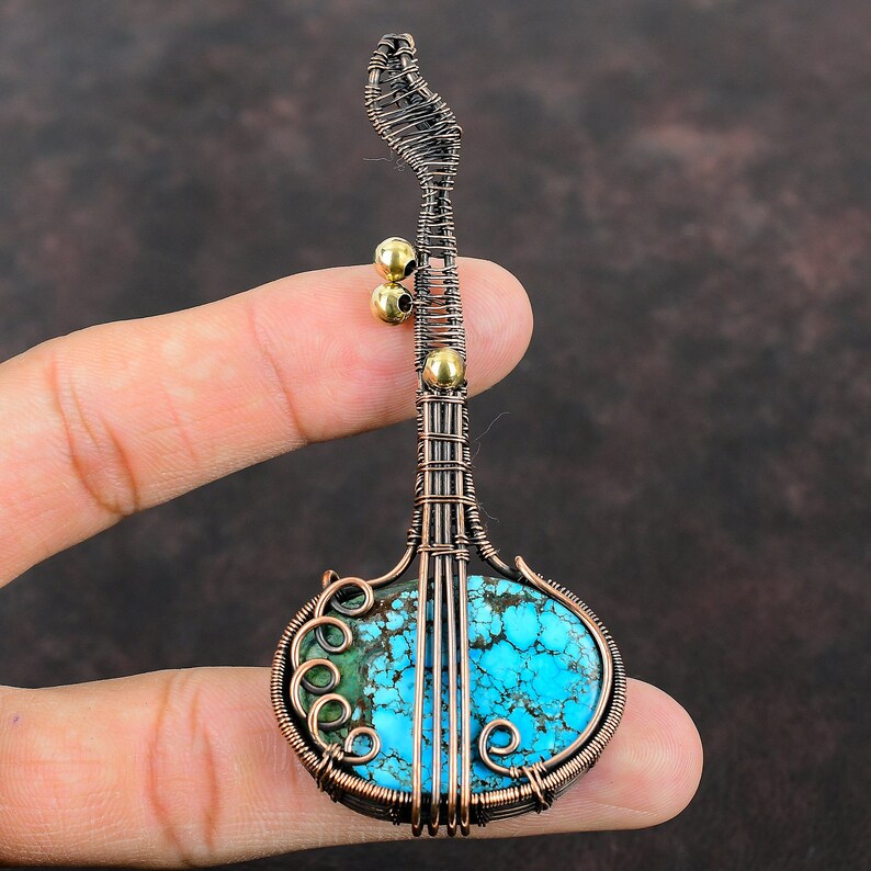 #TurquoiseStone
#CopperWire
#WireWrapJewelry
#NaturalGemstone
#WrappedPendant
#CopperPendant
#WireJewelry
#GuitarPendant
#Handmade
#WireWeaving
#WireWrapping
#CopperTurquoise
#HandmadeJewelry
#WireWrappingStone
#GemstoneJewelry
#HandmadeCopperJewelry