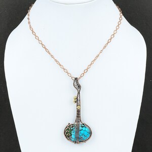 #TurquoiseStone
#CopperWire
#WireWrapJewelry
#NaturalGemstone
#WrappedPendant
#CopperPendant
#WireJewelry
#GuitarPendant
#Handmade
#WireWeaving
#WireWrapping
#CopperTurquoise
#HandmadeJewelry
#WireWrappingStone
#GemstoneJewelry
#HandmadeCopperJewelry