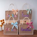 Personalized Bridesmaid Tote Bags, Name tote bag with charm, Bridesmaid Initials Bachelorette Party Wedding Gift, Custom Burlap Beach Bags product logo