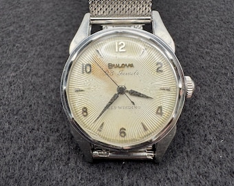 Vintage Bulova Self Wind 23 Jewel Scalloped Bezel. Runs well.
