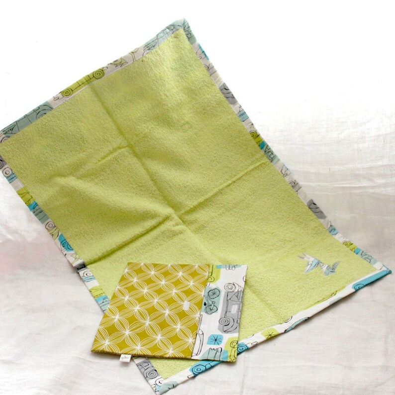 Carpet has nomadic Langer and its matching diaper pouch