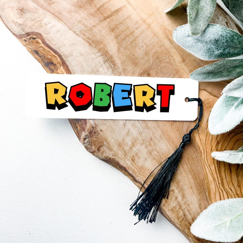 Bookmark with name in red, yellow, blue and green colors.
