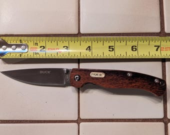正規中古 Buck X48 フラットブレード 木製ハンドル 折りたたみポケット 