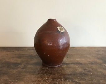 Ovoid Redware Jug With Make Do Repair And Folk Painted Flower Decoration, American, Early To Mid 19th Century