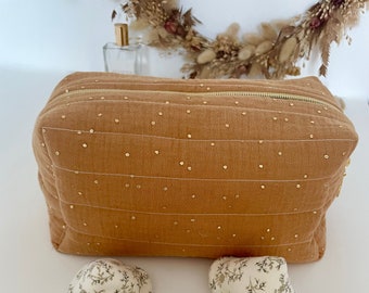 Customizable quilted camel toiletry bag