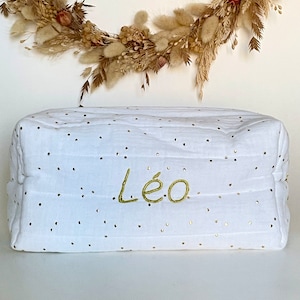 Customizable white quilted toiletry bag