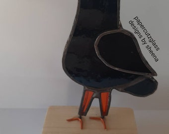 Stained glass chough on plinth