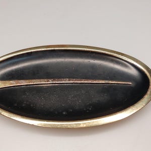 Mid century ashtray brass black colored