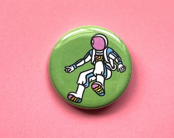 Floating Astronaut Pinback Buttons - Cute 1.25” Green Pinback Button Badges with Rainbow Astronauts in Zero-G