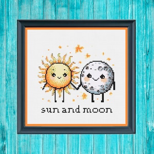 May include: A cross-stitch pattern featuring a cartoon sun and moon holding hands with the text "sun and moon" below.