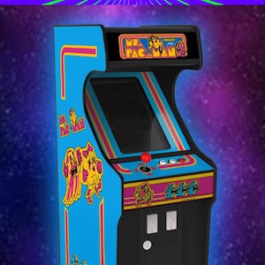 May include: A blue and black arcade cabinet with a Pac-Man design. The cabinet has a screen, joystick, and buttons. The cabinet is a miniature version of a classic arcade game.