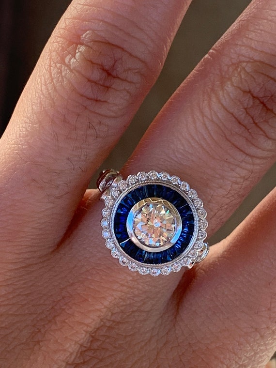 Diamond sapphire halo ring