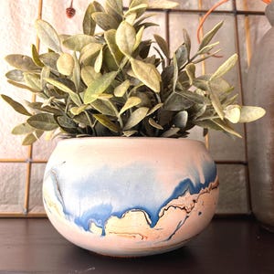 Vintage Nemadji pottery planter pot vase in orange blue black swirl on natural clay Tourist pottery