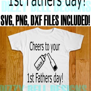 May include: A white t-shirt with black text that reads "Cheers to your 1st Fathers day!" and a graphic of a baby bottle and a beer bottle.