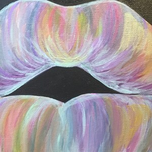 May include: An acrylic painting on canvas depicting a pair of lips rendered in a blend of pastel colors including lavender, soft pink, pale yellow, and light blue. The brushstrokes are visible, creating a textured effect against a solid black background.