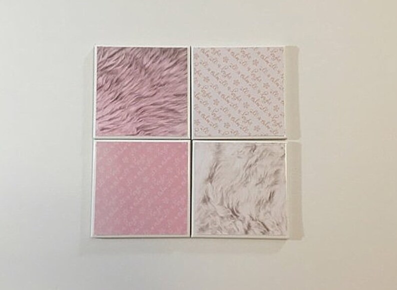 May include: Four square tiles with different patterns. The top left tile has a pink fuzzy texture. The top right tile has a white background with a light pink repeating pattern. The bottom left tile has a solid pink colour with a light pink repeating pattern. The bottom right tile has a white fuzzy texture.