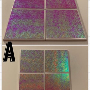 May include: Set of eight iridescent coasters with a pink, blue, and green color scheme. The coasters are square and have a white border.