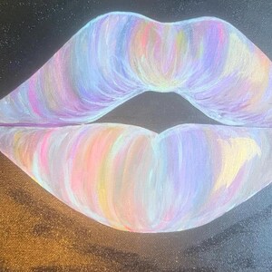 May include: A painting on a black canvas featuring a pair of lips rendered in a blend of pastel colors including light pink, lavender, soft yellow, and pale blue. The brushstrokes are visible, creating a textured effect across the lip shape.