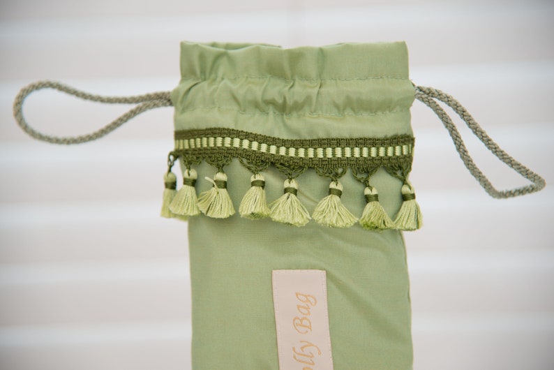 Pretty Mint Green Satin with Mint Green Tassel trim detail umbrellabrolly bag