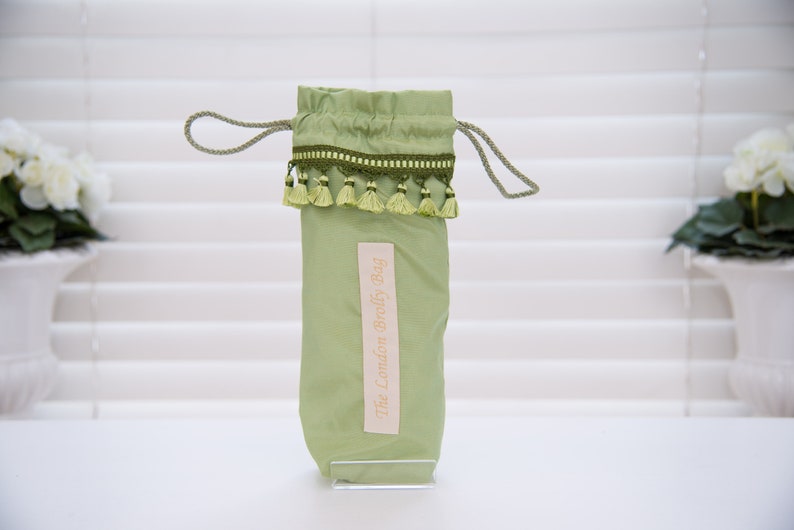 Pretty Mint Green Satin with Mint Green Tassel trim detail umbrellabrolly bag