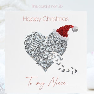 Carte de Noël coeur papillon argenté pour Noël à ma nièce. À notre nièce disponible aussi