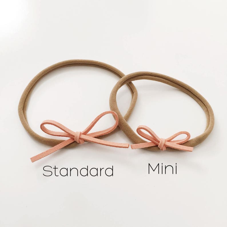 Faux suede bow on nylon headband a sweet and simple baby girls bow