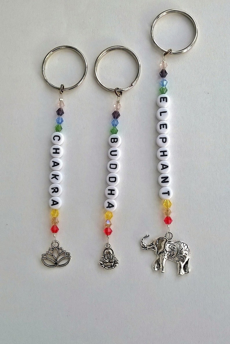 Handmade Personalised Initial Lotus Flower Keyring Bag Charm with Hamsa Hand and Buddhas