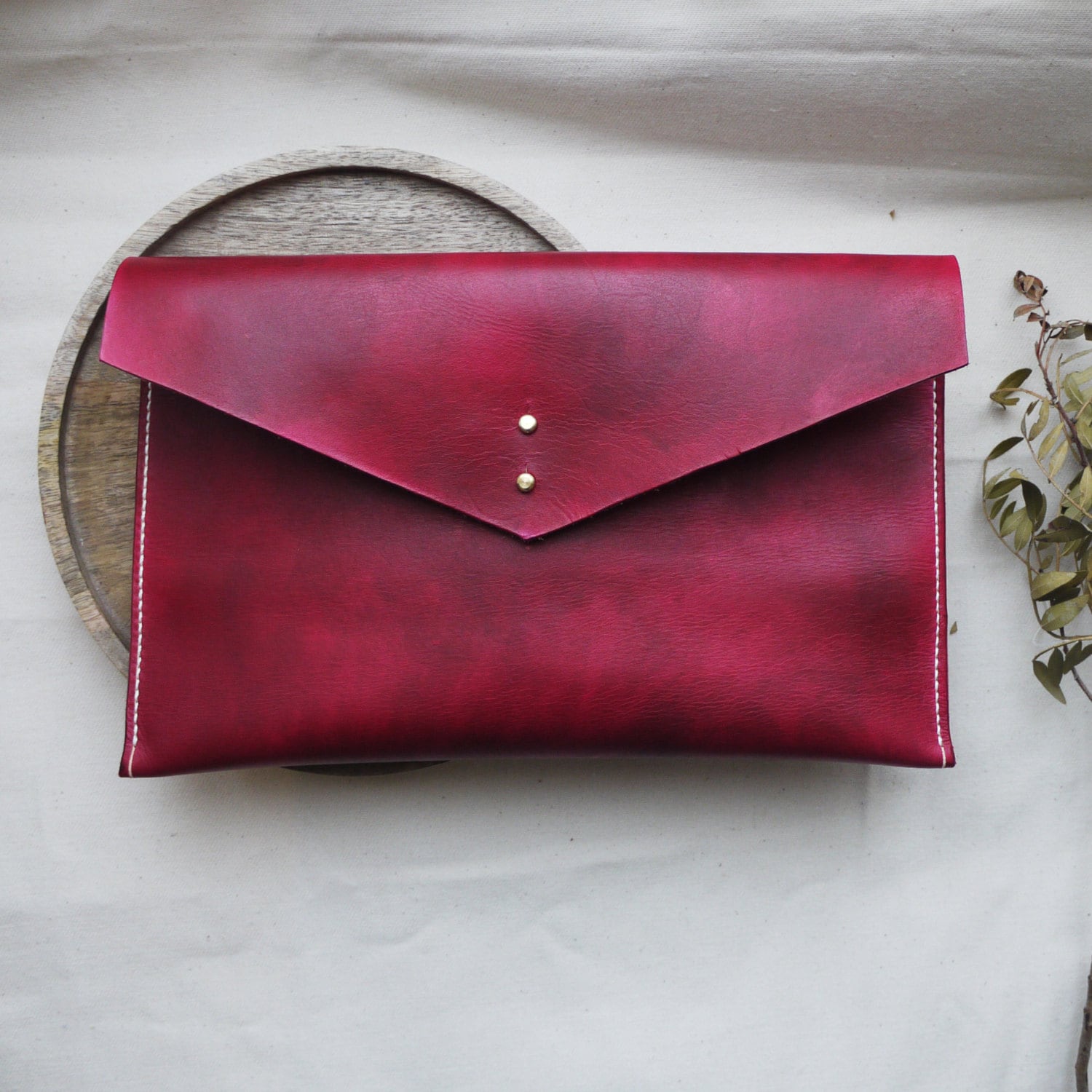 oxblood clutch bag