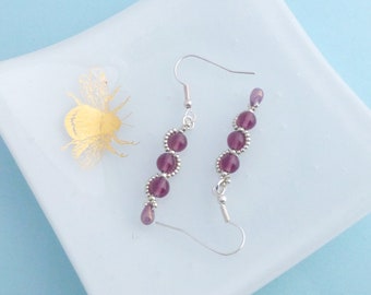 Amethyst Purple Glass Dangle Earrings with a Silver Beaded Wave