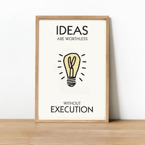 May include: A framed print with a black and white illustration of a light bulb and the text "Ideas are worthless without execution."