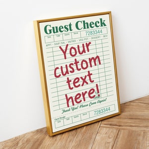 May include: A gold framed sign with a white background and green and red text that reads "Guest Check" and "Your custom text here!"  The sign has a grid pattern and the text "7283344" appears twice.