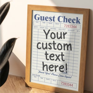 May include: A framed printable guest check with a blue and white design. The text "Guest Check" is at the top of the check. The text "Your custom text here!" is in the center of the check. The text "Thank You! Please Come Again!" is at the bottom of the check. The number "7283344" is printed on the check.