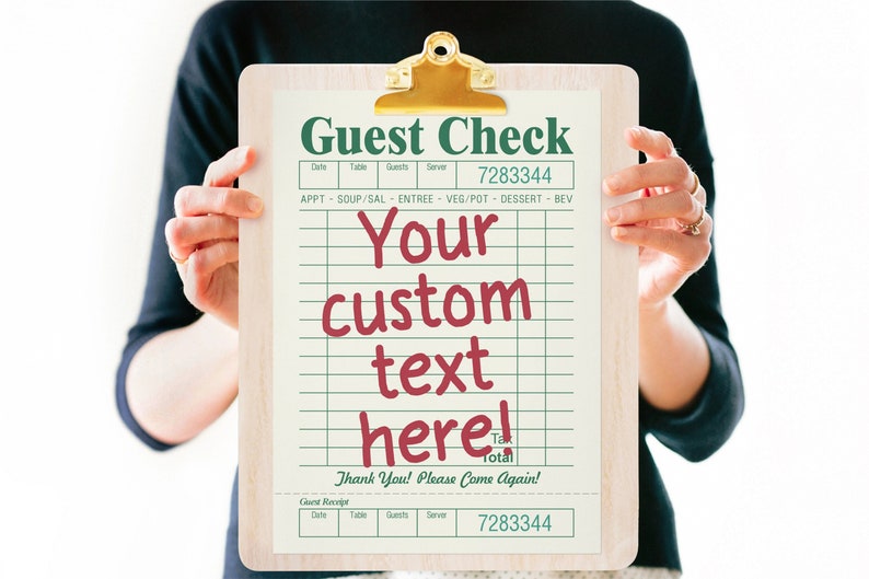 May include: A white guest check clipboard with green and red text. The text reads "Guest Check", "Your custom text here!" and "Thank You! Please Come Again!" The clipboard has a gold clip and a white background with green lines.