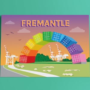 May include: A colourful illustration of a rainbow arch made of shipping containers, with the word "FREMANTLE" in orange letters at the top. The containers are stacked on top of each other, creating a rainbow effect. There are two cranes in the background, and a green grassy area in the foreground.