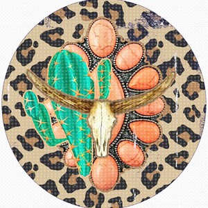 May include: A round, brown and black leopard print background with a turquoise cactus, a white cow skull with horns, and a cluster of coral-colored stones.