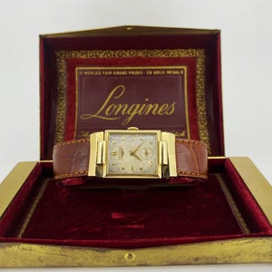 Longines 14K Gold ref 3389, 22.L c1953 Rectangle Hinged Articulated Adaptive Lugs Dress Watch + Box